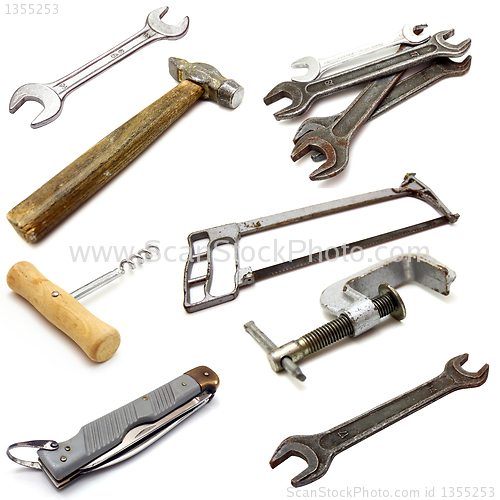 Image of set of different tools over white background