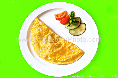 Image of Omelette on a green background
