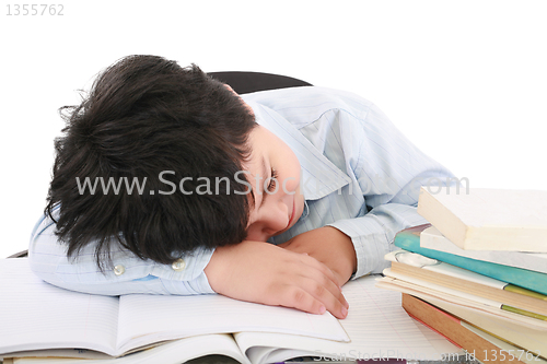 Image of adorable boy tired to study a over white background 