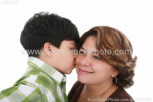 Image of little boy kiss his mother on a white background 