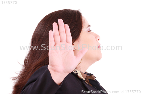 Image of Serious business woman making stop sign over white, focus on wom