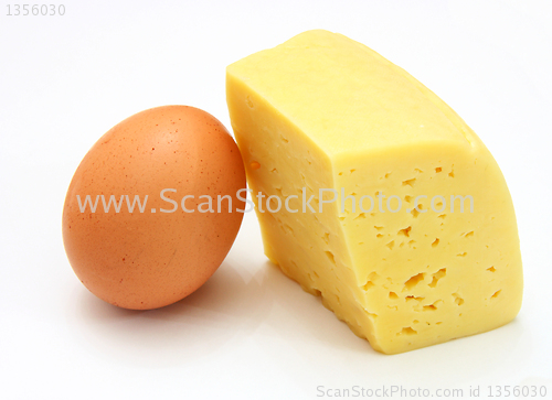 Image of cheese and eggs, isolated on white.