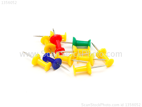 Image of colorful office pins isolated