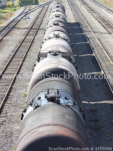 Image of The train transports oil in tanks .