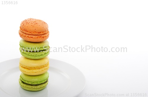 Image of Colorful macarons on a white plate