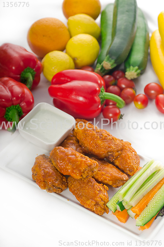 Image of  buffalo chicken wings served with pinzimonio