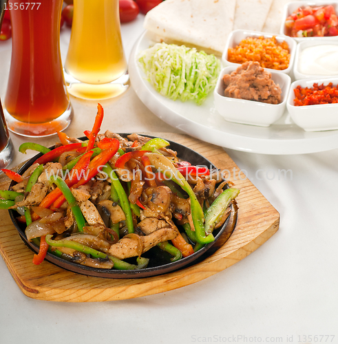 Image of original fajita sizzling hot  on iron plate