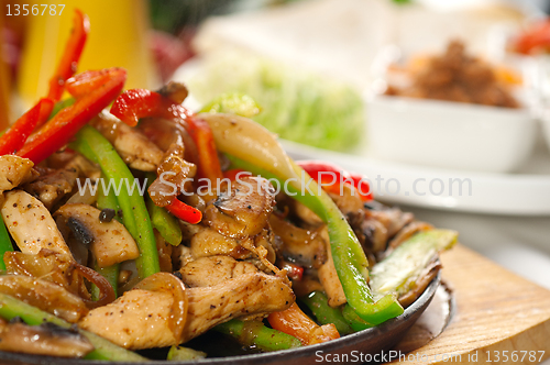 Image of original fajita sizzling hot  on iron plate