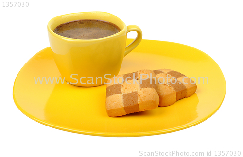 Image of coffee and biscuits on a yellow plate