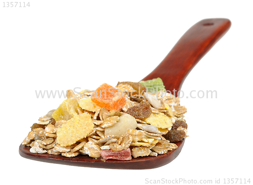 Image of muesli on a wooden spoon