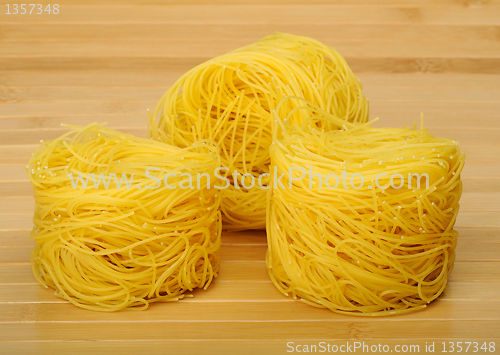 Image of pasta on wooden background