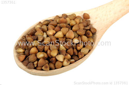 Image of buckwheat in a wooden spoon