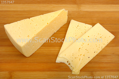 Image of cheese on a wooden board