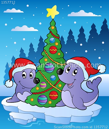 Image of Two seals with Christmas tree