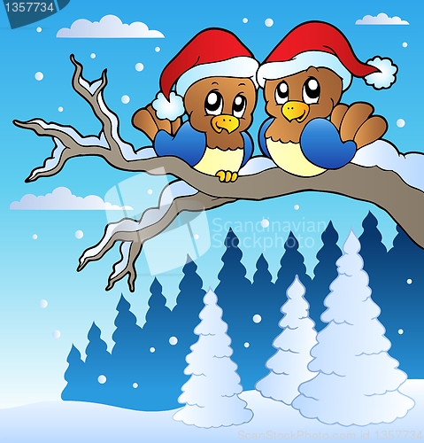 Image of Two cute birds with Christmas hats