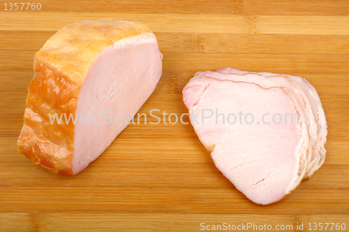 Image of meat on a wooden cutting board