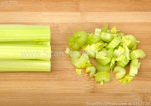 Image of celery on a wooden board