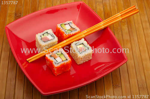 Image of sushi on wooden background