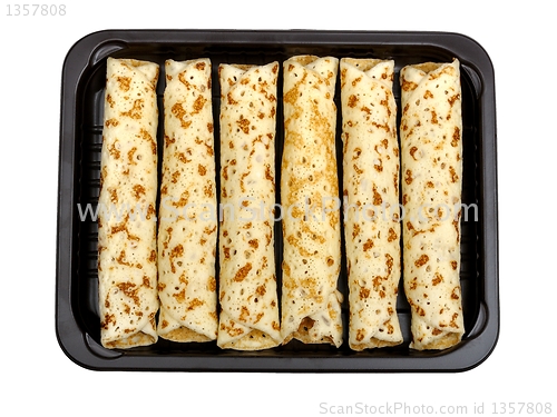 Image of pancakes on a plastic box