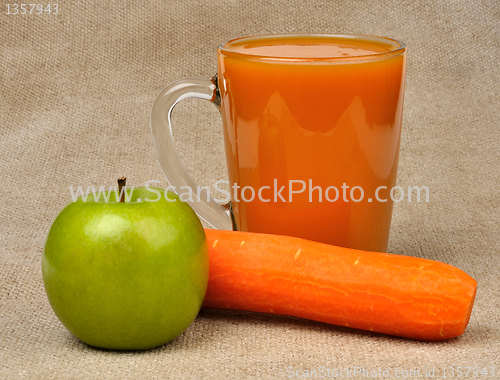 Image of apple carrot and a glass of juice
