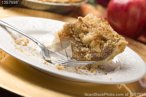 Image of Half Eaten Apple Pie Slice with Crumb Topping