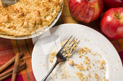 Image of Overhead Abstract of Apple Pie, Empty Plate and Crumbs