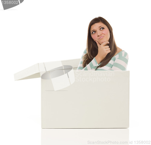 Image of Ethnic Female Popping Out and Thinking Outside The Box