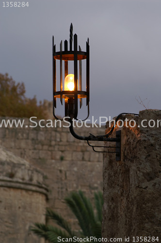 Image of a lamp in a night street