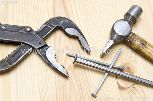 Image of Old hammer and nails 