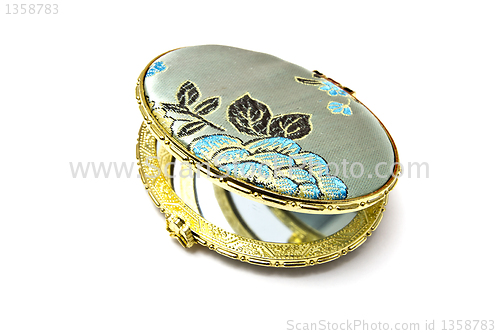 Image of Red cosmetic mirror isolated on white background 
