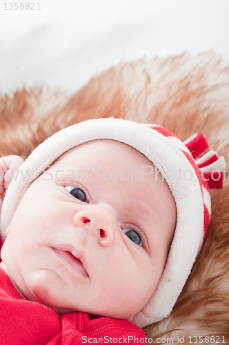 Image of Newborn baby in chritstmas hat