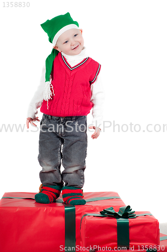 Image of Christmas toddler with presents