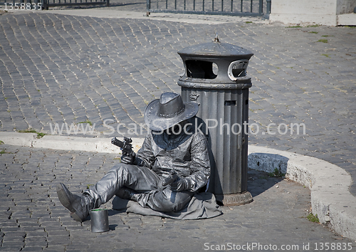 Image of Silver gun man Rome