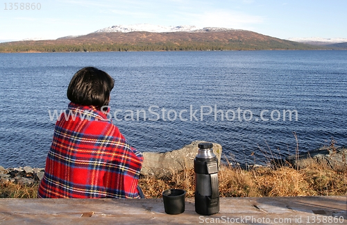 Image of Woman by lake