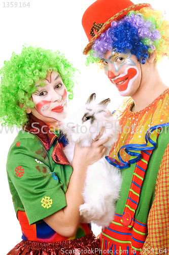 Image of Couple of clowns with a white rabbit