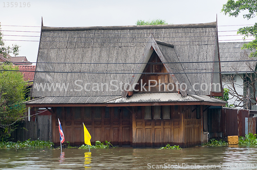 Image of Flooded teak house in Bangkok, Thailand