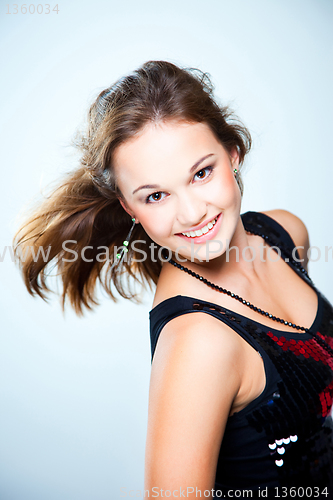 Image of Portrait of young beautiful disco dancer girl