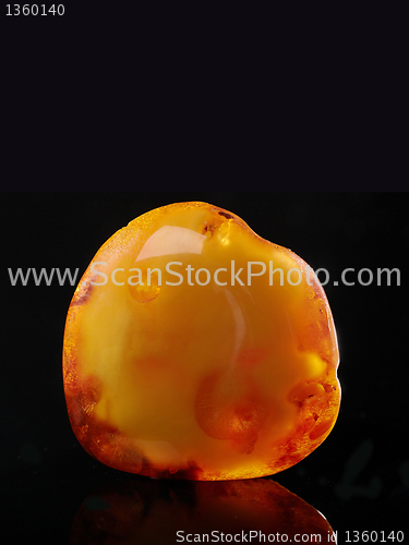 Image of big amber on black background