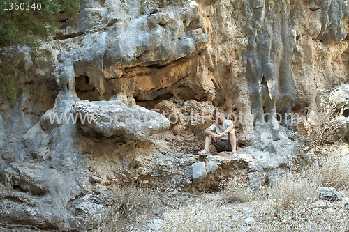 Image of Rock Climber have a rest mountains