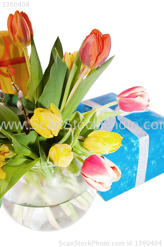 Image of Tulips and boxes with gifts, it is isolated on white