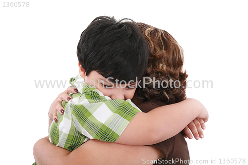 Image of Portrait of happy kid embracing his mother