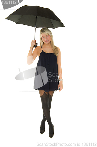 Image of Young happy girl in dress