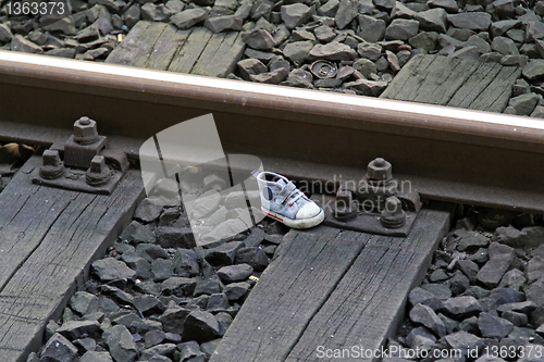 Image of Shoe at railroad