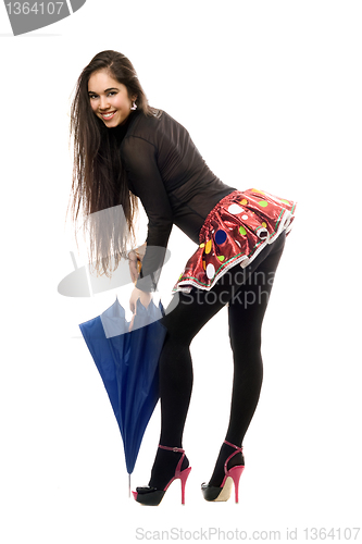 Image of Smiling pretty brunette with umbrella