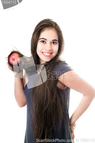 Image of Smiling girl with an apple