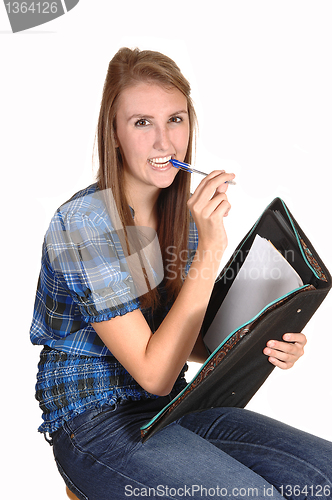 Image of Teen girl thinking.