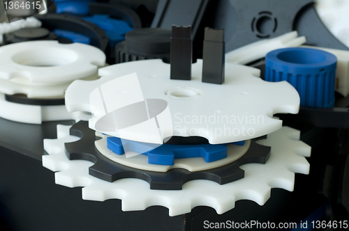 Image of Plastic machine parts. Vertical imagel