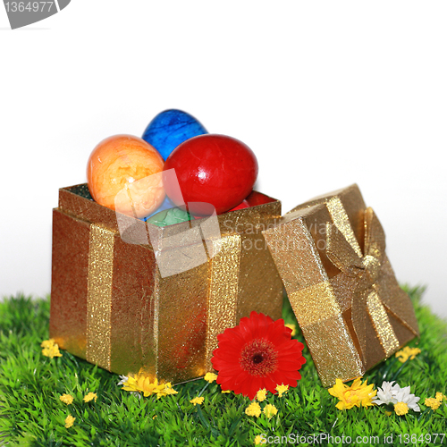 Image of Easter eggs in a golden package 
