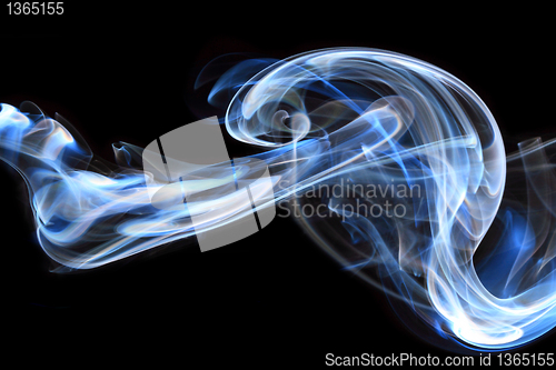 Image of Blue smoke in black background