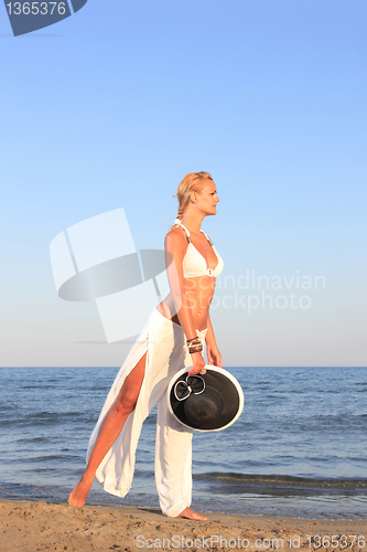 Image of  woman relaxing on the beach